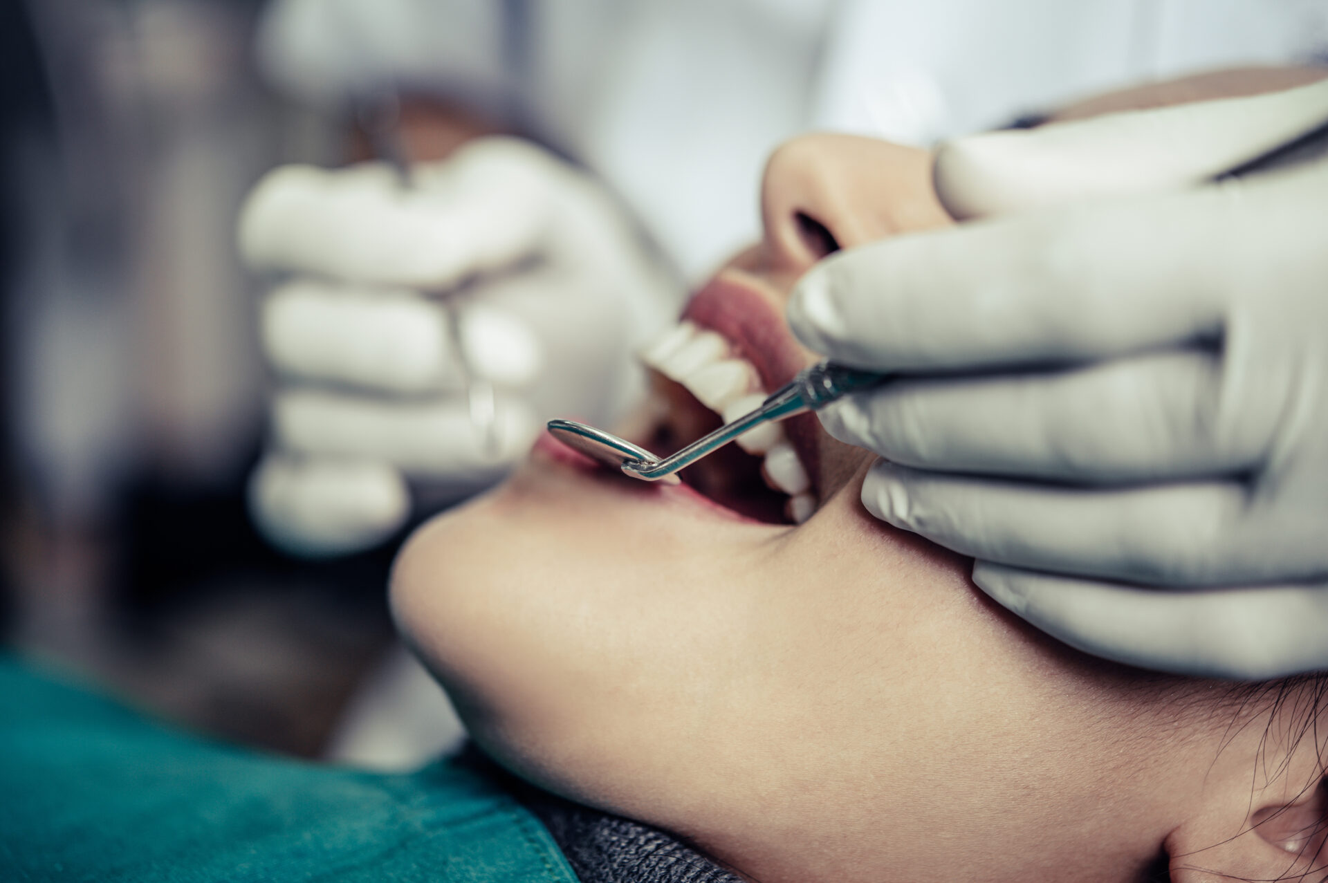 Oral Surgery Dentists treat patients' teeth.